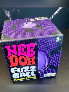NeeDoh Purple Fuzz Ball “Flower Power” Stress Relief Sensory Toy- Purple. NIB